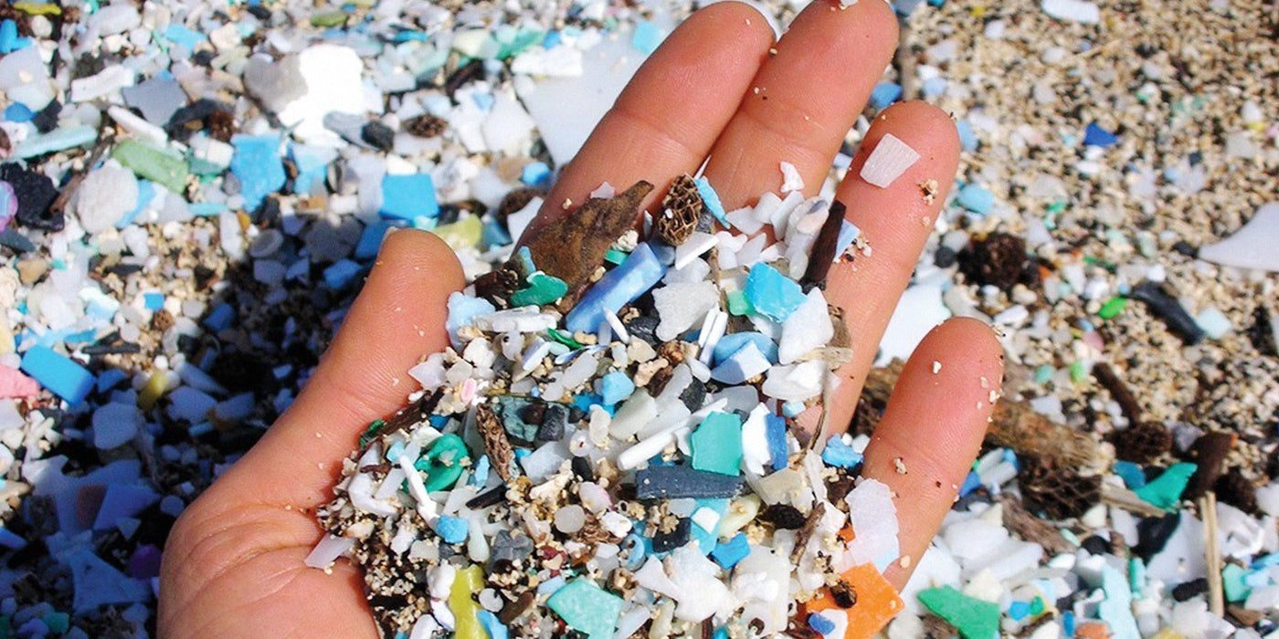 microplastics in a persons hand