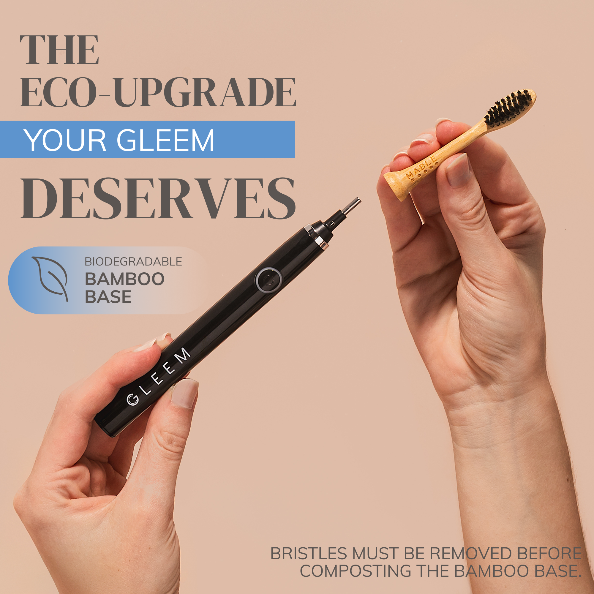Gleem electric toothbrush with biodegradable bamboo head by MABLE on base on a beige background with woman's hand holding the eco freindly head and the toothbrush