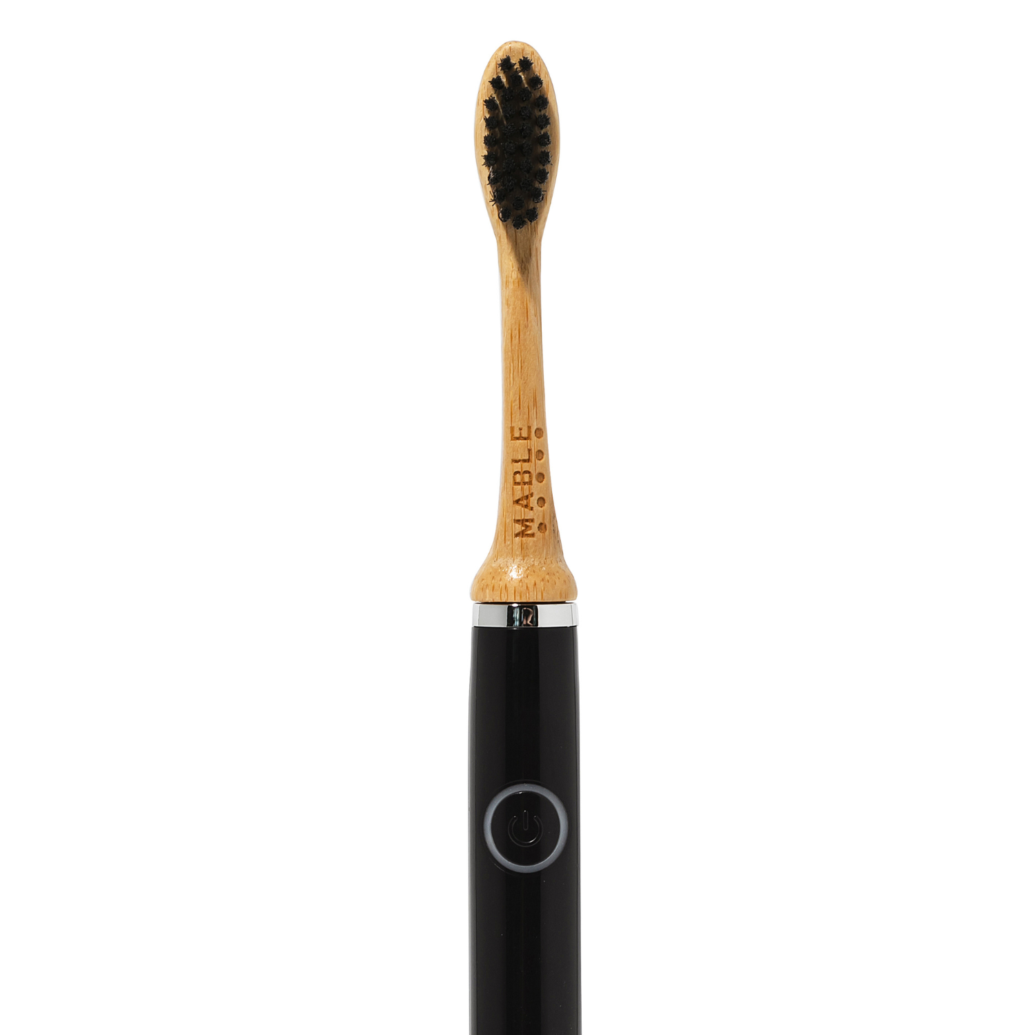 MABLE eco friendly bamboo toothbrush head with black plant-based nylon bristles on a white background sitting on top of a Gleem electric toothbrush