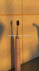 MABLE bamboo electric heads showing Sonicare, Gleem, AquaSonic models in a warmly lit natural sunlight